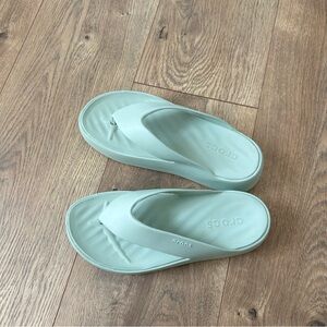 Crocs Women's Getaway Platform Flip Flop Sandals in light green size 6